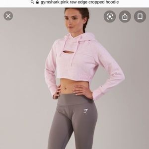Gymshark pink raw edge cropped hoodie size small.